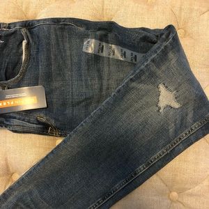 Old navy mans pants with sight distressed